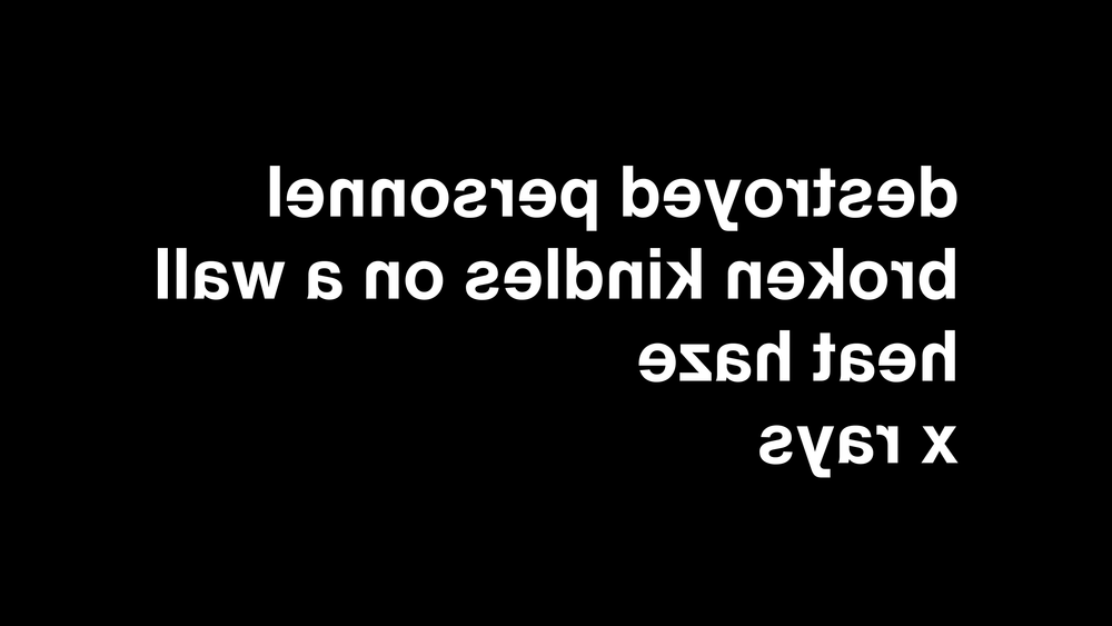 Mirrored, white-on-black text